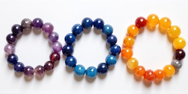Vibrant chakra bracelets and crystal gemstone pendants