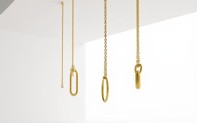 Layered thin gold necklaces